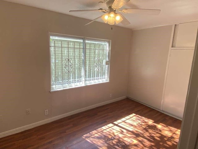 5131 Nassau Rd, Houston, TX 77021 - empty room with healthy amount of natural light, wood finished floors, and ceiling fan