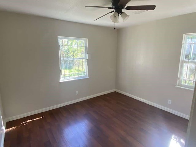 5131 Nassau Rd, Houston, TX 77021 - unfurnished room with plenty of natural light, ceiling fan, and dark wood-style flooring