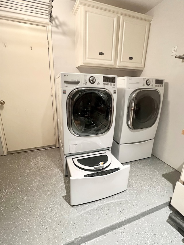 1150 Sienna Hill Dr, Houston, TX 77077 - washroom with cabinet space and washing machine and dryer