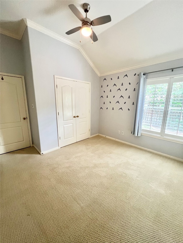 1150 Sienna Hill Dr, Houston, TX 77077 - unfurnished bedroom featuring ornamental molding, lofted ceiling, a closet, light colored carpet, and ceiling fan