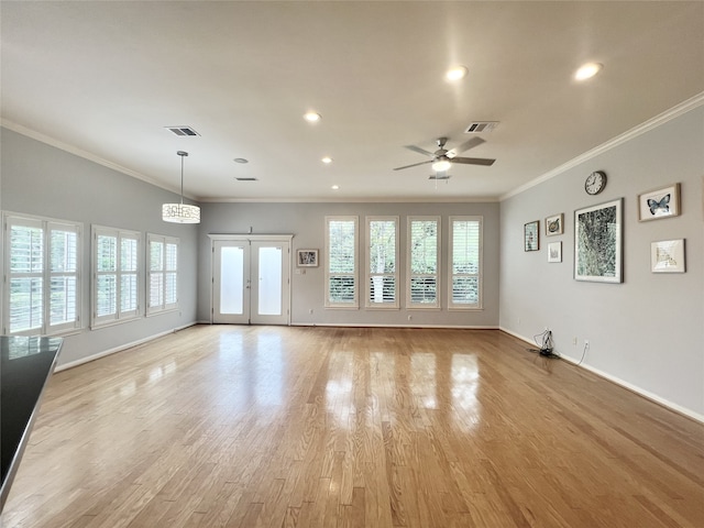 1150 Sienna Hill Dr, Houston, TX 77077 - unfurnished living room with crown molding, ceiling fan, light wood-style flooring, recessed lighting, and a chandelier