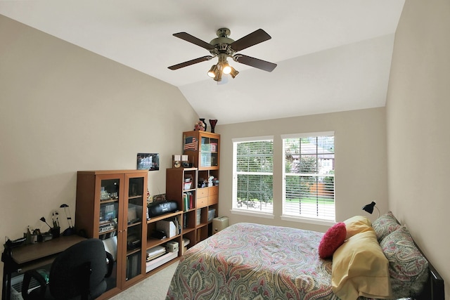 603 Forest Bend Ln, Friendswood, TX 77546 - bedroom with vaulted ceiling, carpet, and a ceiling fan