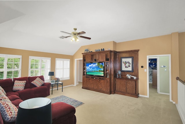 603 Forest Bend Ln, Friendswood, TX 77546 - living area with light carpet, a ceiling fan, and lofted ceiling