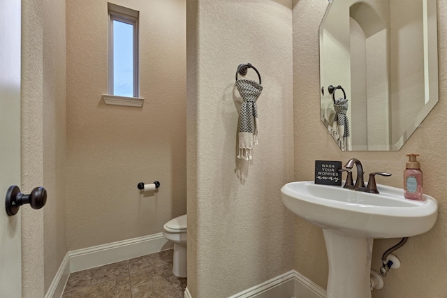 9714 Luna Springs Ln, Cypress, TX 77433 - half bathroom featuring toilet and baseboards