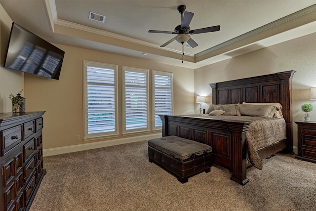 9714 Luna Springs Ln, Cypress, TX 77433 - carpeted bedroom with a tray ceiling, ornamental molding, and ceiling fan