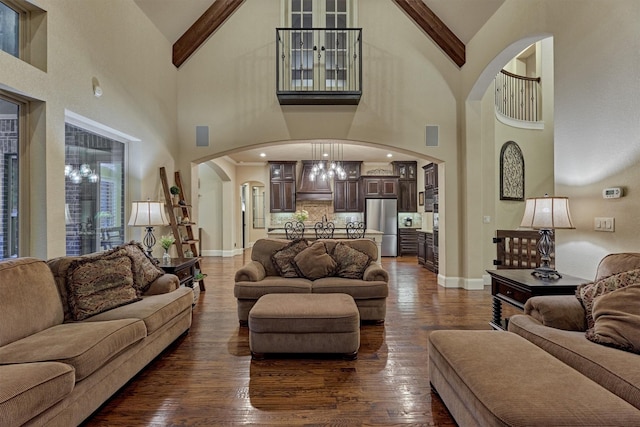 9714 Luna Springs Ln, Cypress, TX 77433 - living room featuring arched walkways, high vaulted ceiling, dark wood-style flooring, and beam ceiling