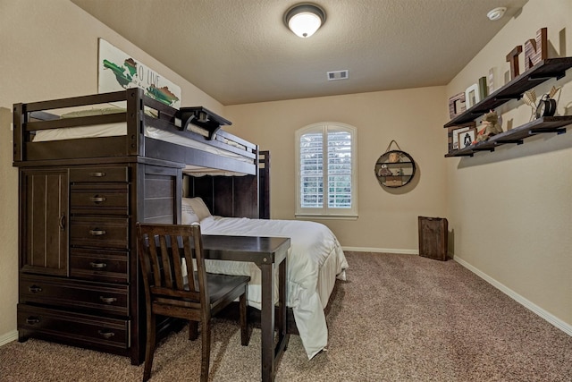9714 Luna Springs Ln, Cypress, TX 77433 - carpeted bedroom featuring baseboards and a textured ceiling
