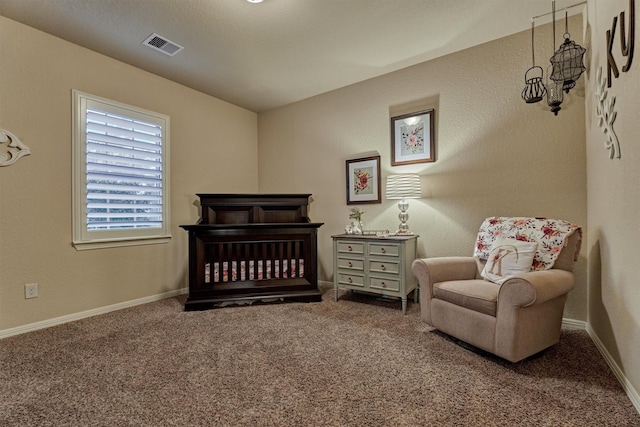 9714 Luna Springs Ln, Cypress, TX 77433 - carpeted bedroom featuring baseboards and a crib