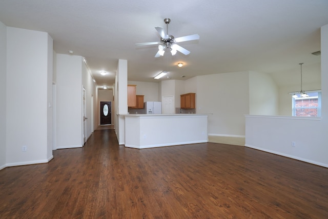 30515 Red Bluff Cir, Magnolia, TX 77355 - unfurnished living room with a ceiling fan and dark wood-style flooring