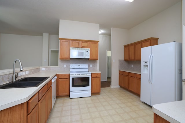 30515 Red Bluff Cir, Magnolia, TX 77355 - kitchen with white appliances, light flooring, tasteful backsplash, and light countertops