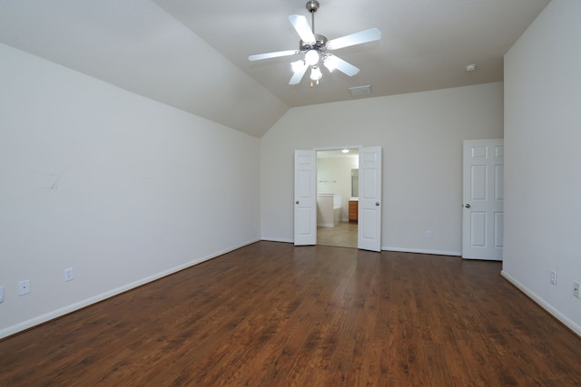 30515 Red Bluff Cir, Magnolia, TX 77355 - unfurnished bedroom featuring vaulted ceiling, dark wood finished floors, and a ceiling fan