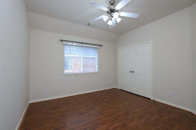 30515 Red Bluff Cir, Magnolia, TX 77355 - unfurnished bedroom featuring dark wood-type flooring, a closet, vaulted ceiling, and ceiling fan