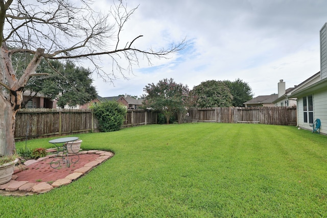 30515 Red Bluff Cir, Magnolia, TX 77355 - fenced backyard featuring a patio area