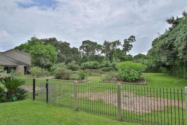 9400 Doliver Dr Unit 70, Houston, TX 77063 - view of yard featuring a vegetable garden