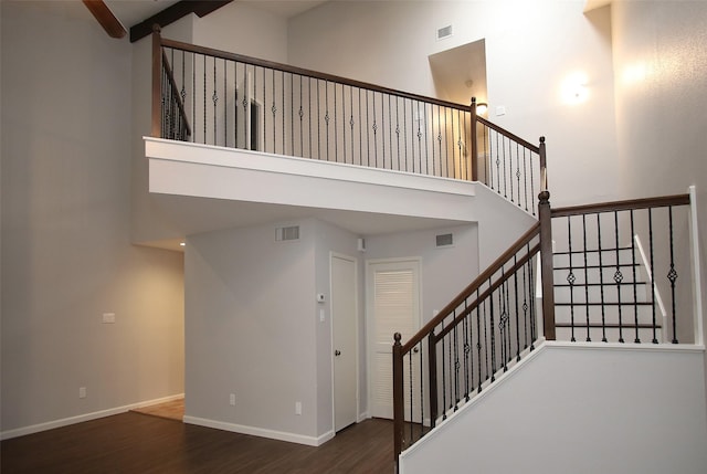 9400 Doliver Dr Unit 70, Houston, TX 77063 - stairs with a high ceiling and wood finished floors