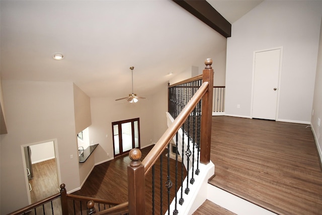 9400 Doliver Dr Unit 70, Houston, TX 77063 - staircase featuring high vaulted ceiling, a ceiling fan, wood finished floors, and beam ceiling
