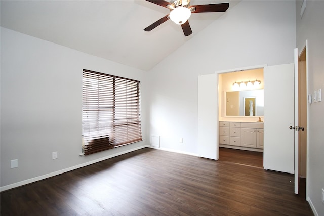 9400 Doliver Dr Unit 70, Houston, TX 77063 - unfurnished bedroom with high vaulted ceiling, dark wood-style floors, ensuite bath, and ceiling fan