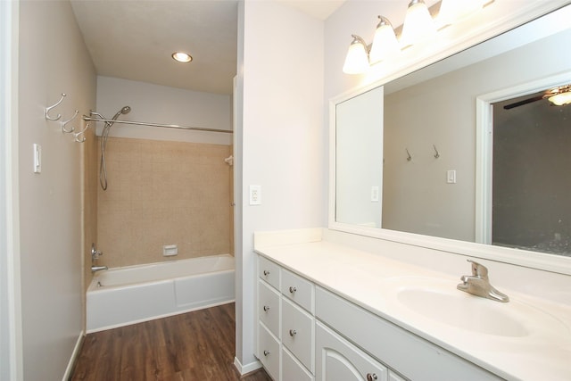 9400 Doliver Dr Unit 70, Houston, TX 77063 - full bathroom with vanity, wood finished floors, bathtub / shower combination, and recessed lighting