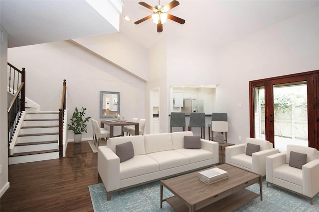 9400 Doliver Dr Unit 70, Houston, TX 77063 - living room featuring stairway, a ceiling fan, wood finished floors, and high vaulted ceiling