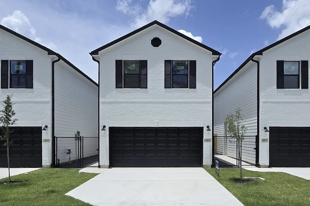 4817 Keeland St, Houston, TX 77016 - view of front of home featuring a garage, a gate, and driveway