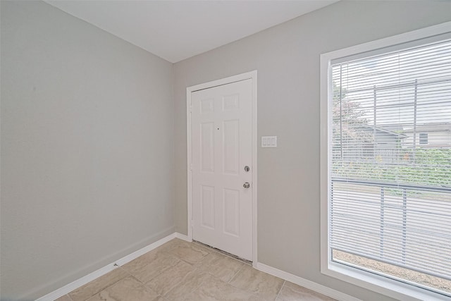 3024 Brackenridge St, Houston, TX 77026 - entrance foyer with baseboards and light tile patterned flooring