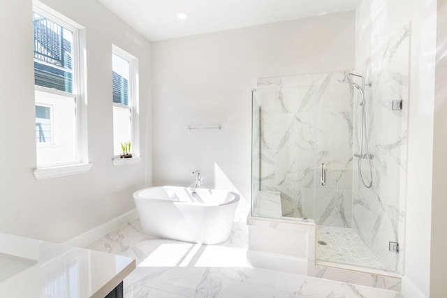 612 Delmar, Houston, TX 77023 - full bath with a marble finish shower, a freestanding tub, vanity, and marble finish floors