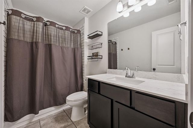 15603 Beltie Dr, Humble, TX 77346 - bathroom with tile patterned floors, vanity, and shower / tub combo with curtain