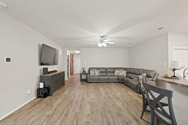 15010 Sunset Villa Ct, Humble, TX 77396 - living room with light wood-style flooring and a ceiling fan