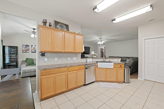 15010 Sunset Villa Ct, Humble, TX 77396 - kitchen featuring dishwasher, ceiling fan, open floor plan, light brown cabinetry, and lofted ceiling
