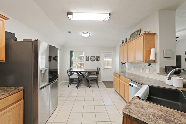 15010 Sunset Villa Ct, Humble, TX 77396 - kitchen with stainless steel appliances, light tile patterned floors, tasteful backsplash, and dark countertops