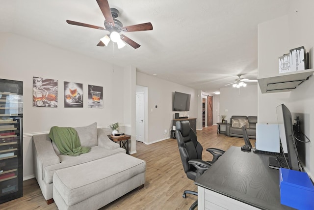 15010 Sunset Villa Ct, Humble, TX 77396 - office featuring a ceiling fan and light wood-style floors