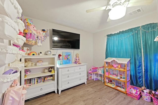 15010 Sunset Villa Ct, Humble, TX 77396 - recreation room featuring wood finished floors and a ceiling fan