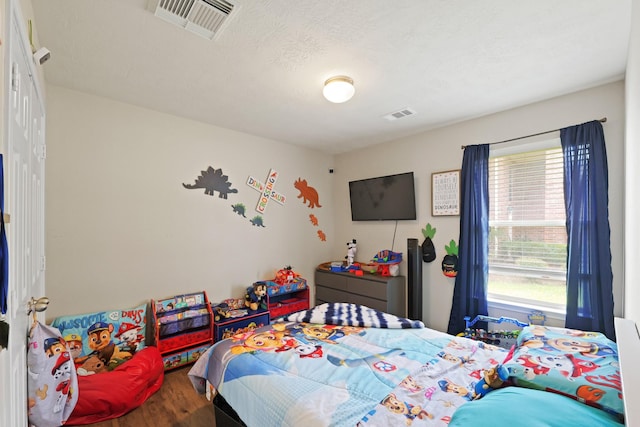 15010 Sunset Villa Ct, Humble, TX 77396 - bedroom featuring wood finished floors