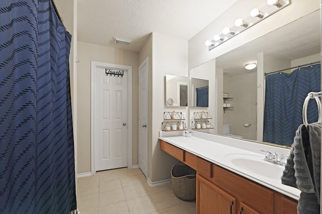 15010 Sunset Villa Ct, Humble, TX 77396 - full bathroom featuring tile patterned flooring, vanity, and curtained shower