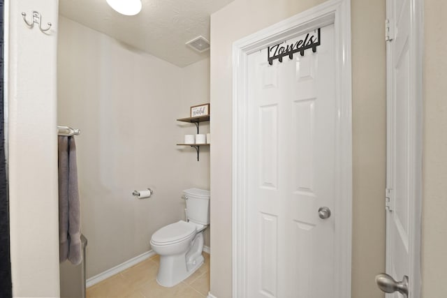 15010 Sunset Villa Ct, Humble, TX 77396 - bathroom featuring toilet and tile patterned flooring