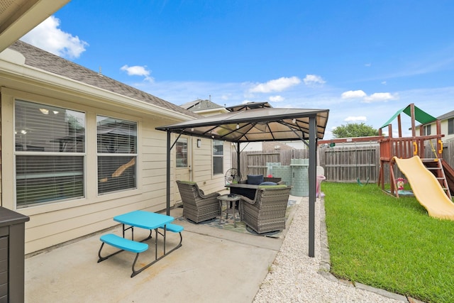 15010 Sunset Villa Ct, Humble, TX 77396 - fenced backyard with an outdoor hangout area, a gazebo, a patio area, and a playground