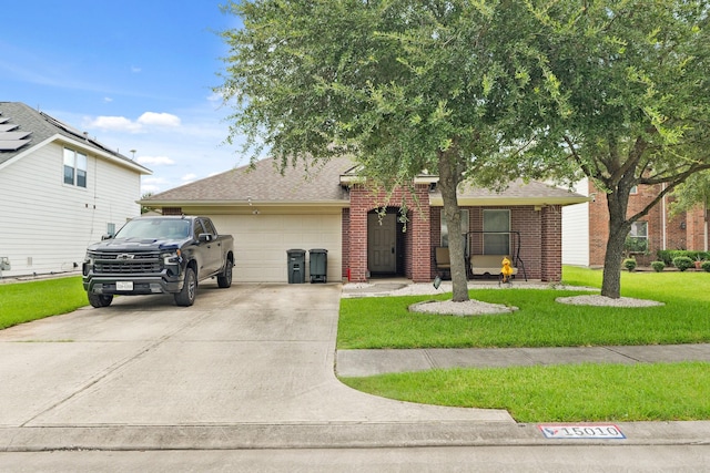 15010 Sunset Villa Ct, Humble, TX 77396 - view of front of home with an attached garage, concrete driveway, a front yard, brick siding, and roof with shingles