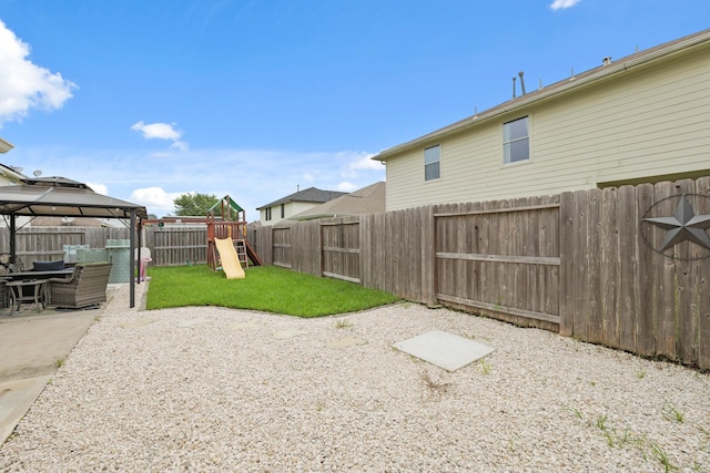 15010 Sunset Villa Ct, Humble, TX 77396 - fenced backyard featuring a gazebo, a playground, and a patio area