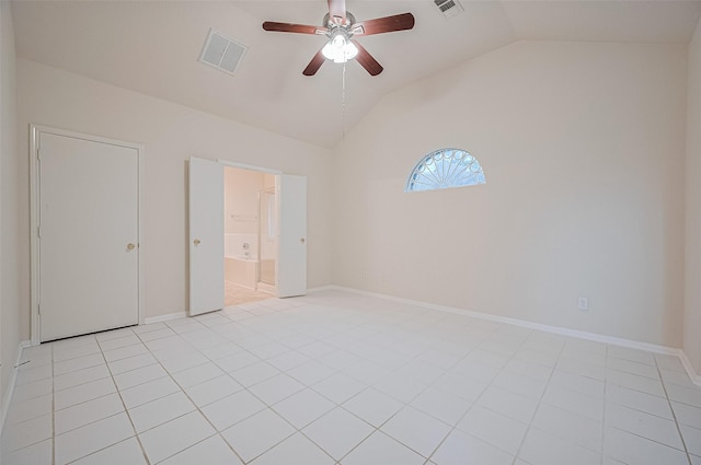 17134 Fairway Glen Ct, Sugar Land, TX 77498 - unfurnished bedroom featuring vaulted ceiling, a ceiling fan, ensuite bathroom, and light tile patterned floors