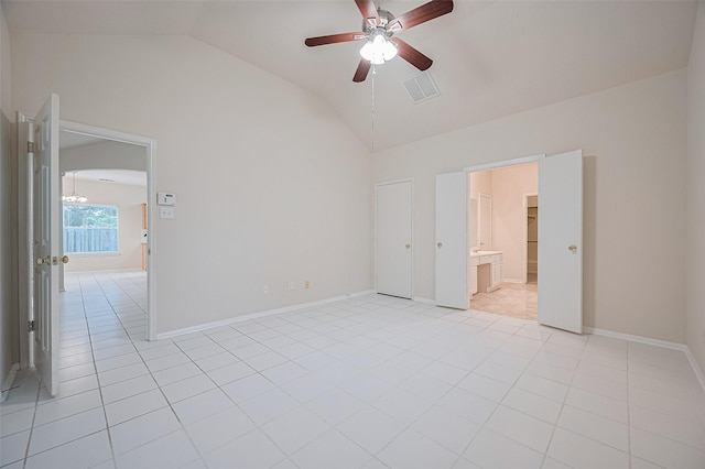 17134 Fairway Glen Ct, Sugar Land, TX 77498 - unfurnished room featuring vaulted ceiling, a ceiling fan, light tile patterned flooring, and a chandelier