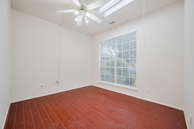 17134 Fairway Glen Ct, Sugar Land, TX 77498 - empty room with dark wood-type flooring and ceiling fan