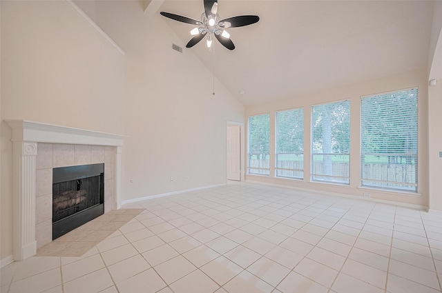 17134 Fairway Glen Ct, Sugar Land, TX 77498 - unfurnished living room with high vaulted ceiling, ceiling fan, a tile fireplace, and light tile patterned floors