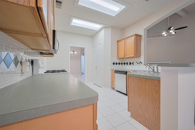 17134 Fairway Glen Ct, Sugar Land, TX 77498 - kitchen featuring appliances with stainless steel finishes, backsplash, a peninsula, light tile patterned floors, and ceiling fan