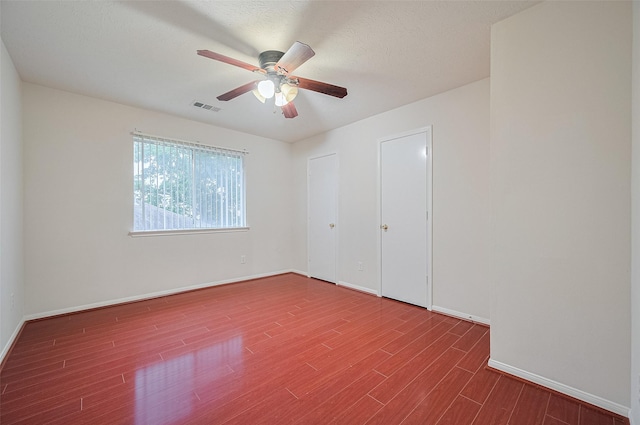 17134 Fairway Glen Ct, Sugar Land, TX 77498 - unfurnished bedroom featuring wood finished floors and ceiling fan