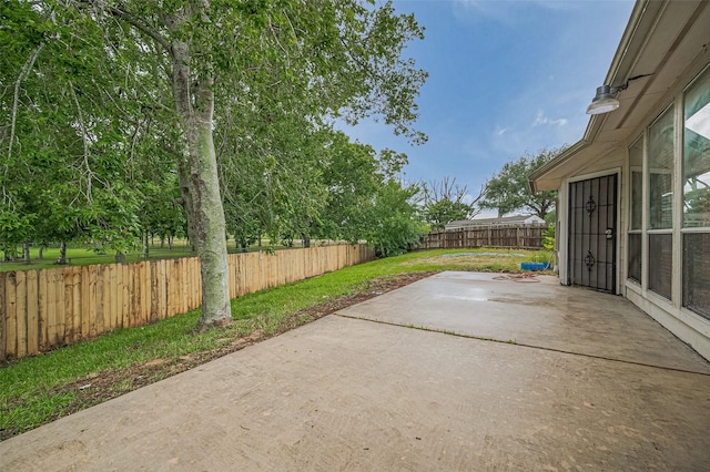 17134 Fairway Glen Ct, Sugar Land, TX 77498 - fenced backyard with a patio area
