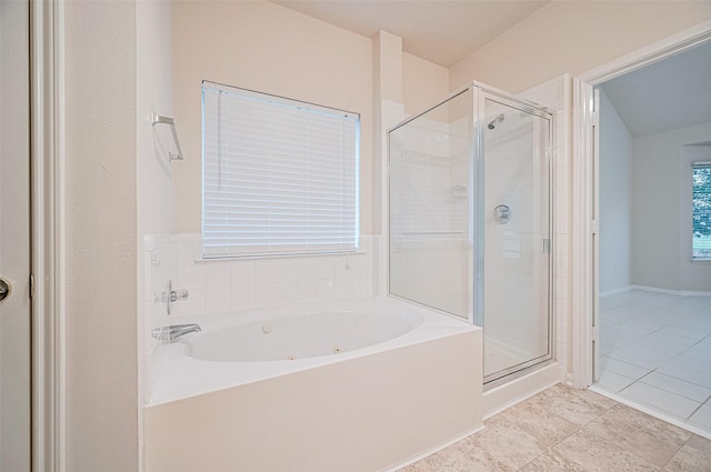 17134 Fairway Glen Ct, Sugar Land, TX 77498 - bathroom with a tub with jets, a shower stall, and tile patterned floors