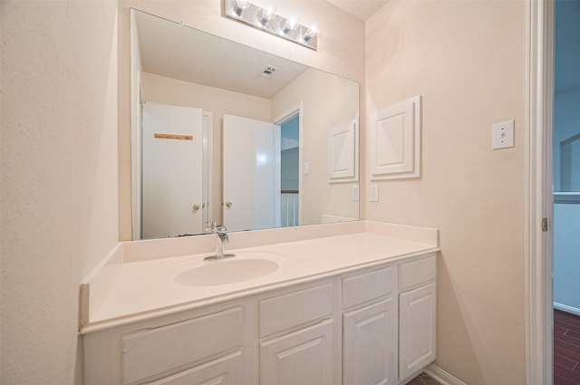 17134 Fairway Glen Ct, Sugar Land, TX 77498 - bathroom featuring vanity and a textured wall