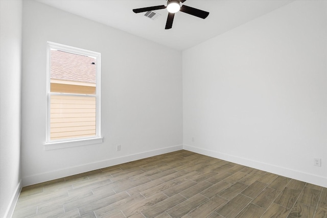 213 N 7th St, La Porte, TX 77571 - empty room featuring wood finished floors and ceiling fan