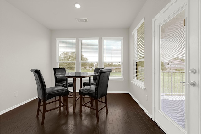 1909 Monaco Memorial Ln, Houston, TX 77043 - dining space with dark wood-style floors and recessed lighting