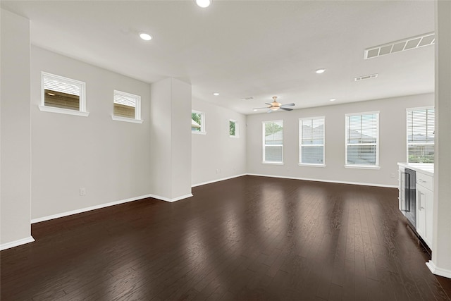 1909 Monaco Memorial Ln, Houston, TX 77043 - spare room featuring a ceiling fan, recessed lighting, and dark wood-type flooring
